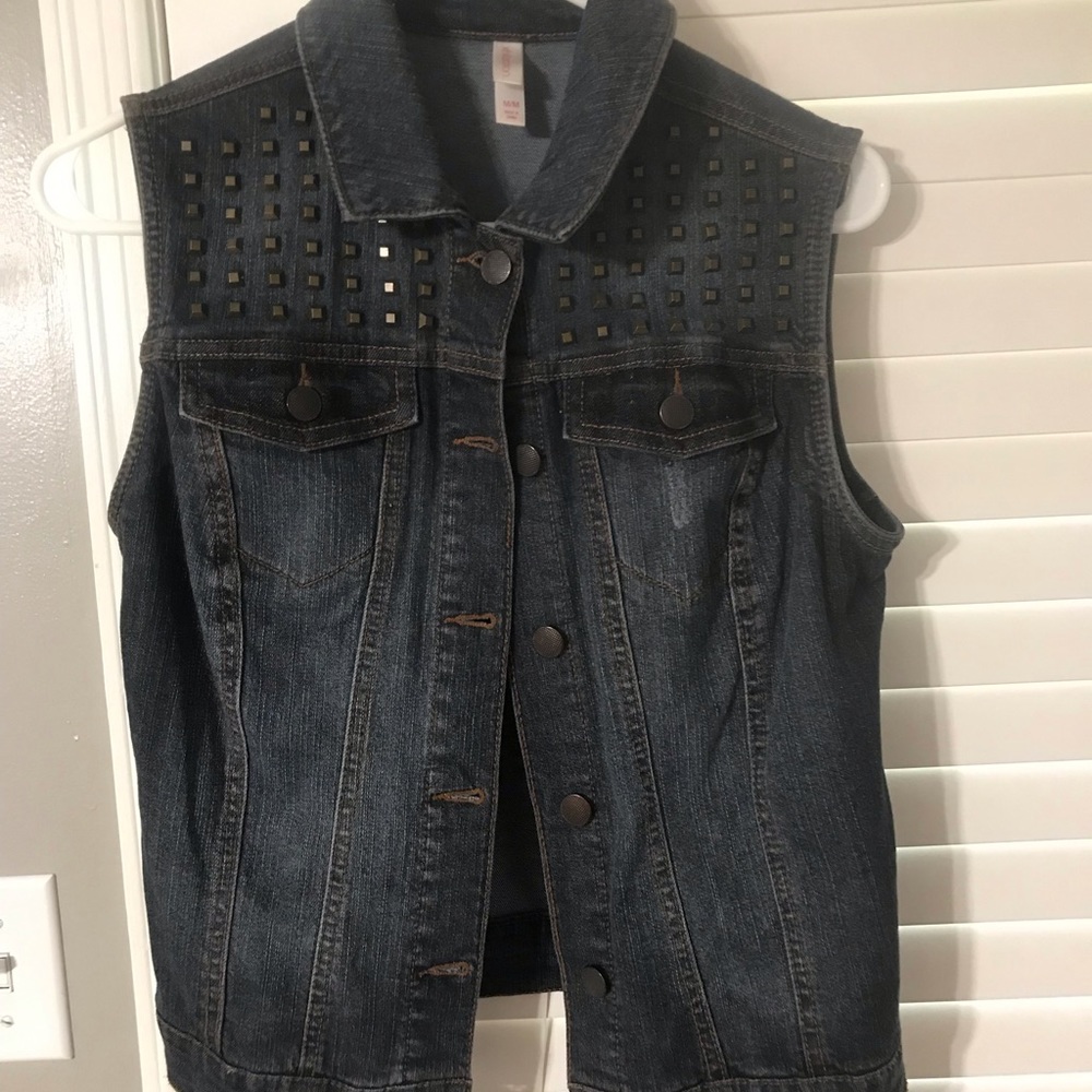 Denim vest with studs size medium. Great condition